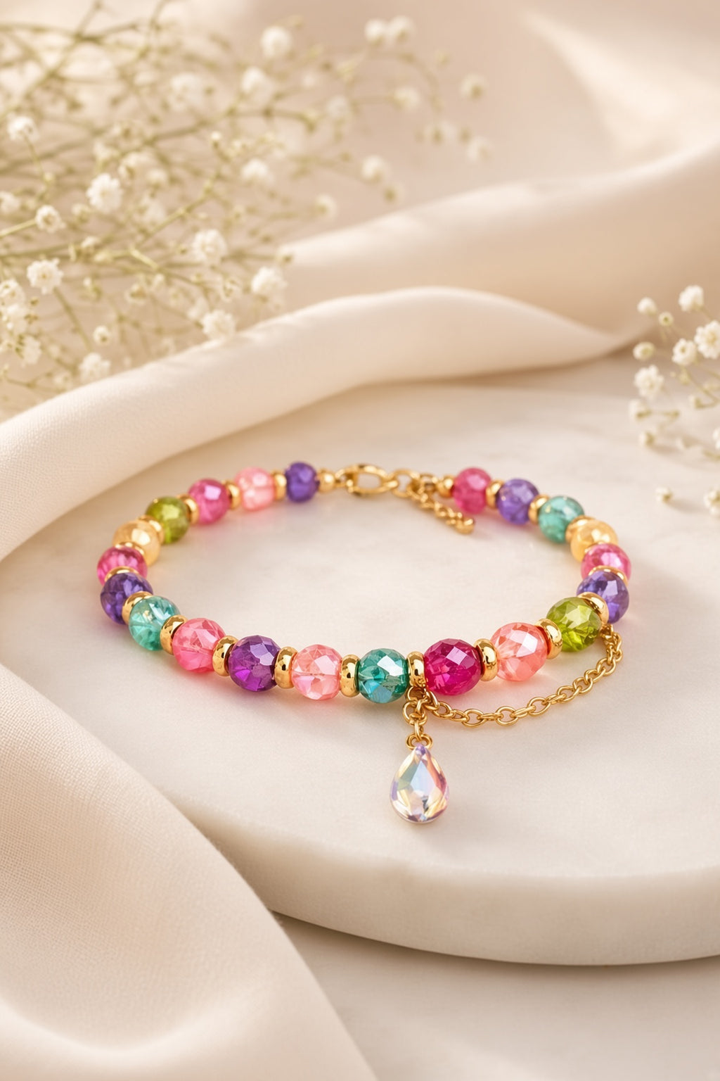 Bracelet multicolore en perles facettées – Goutte irisée
